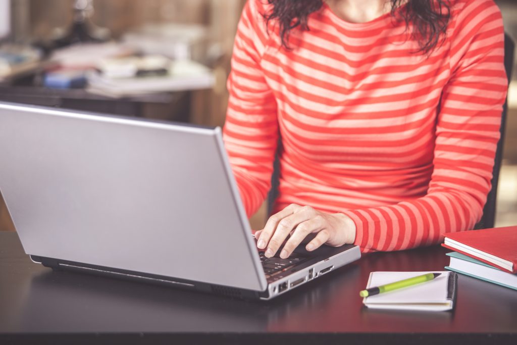 A woman working on her laptop